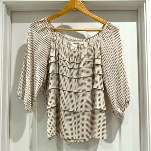 This is a cream and blue polkadot blouse by Studio M. Size Small